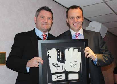 the AAM Suite and presentation of either framed signed goalkeeper gloves or signed Boot in a presentation case signed by your choice of player