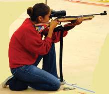 5. If the cross-legged position is uncomfortable and the rifle wants to point low, switch to the cross-ankled position. Extend your legs forward, still with the left leg crossed over the right. 6.