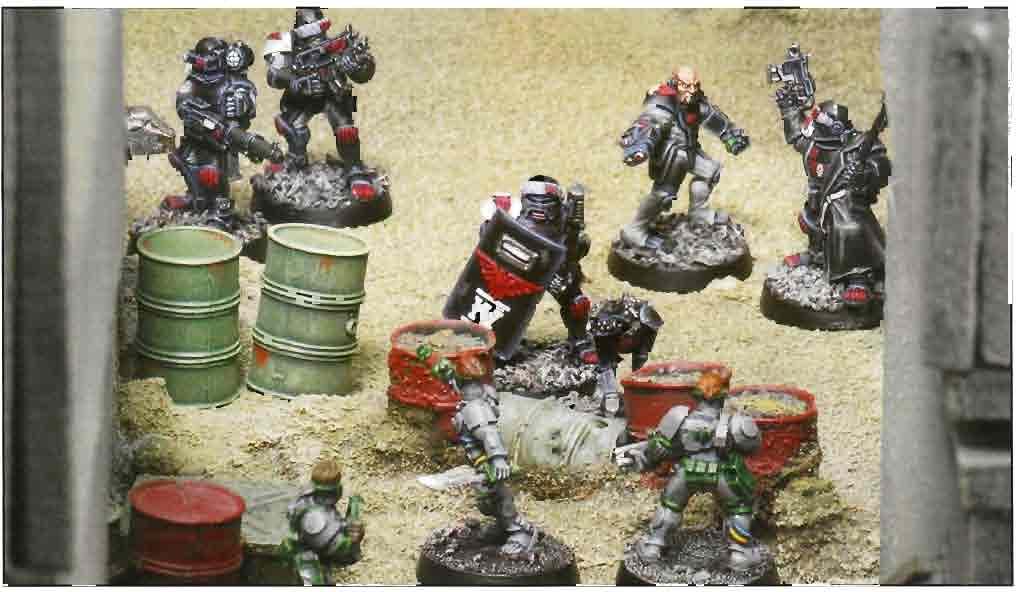 Tbe Enforcer team storm,s the entrencbed Van Saar gang. in the hive, and because of this they often take part in actions th^t are very different to those that typical Underhive gangs participate in.