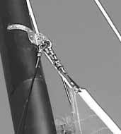 (If the jib is not furled and the line is also not loaded in the drum, wrap the jib around the forestay until it is furled.