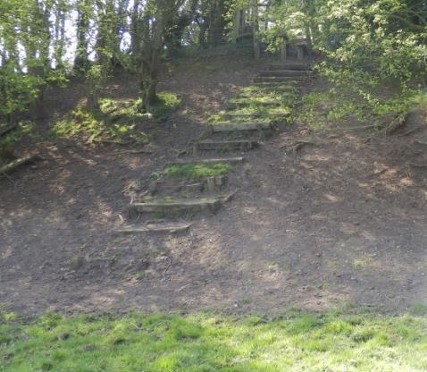 slightly left to a set of steps.