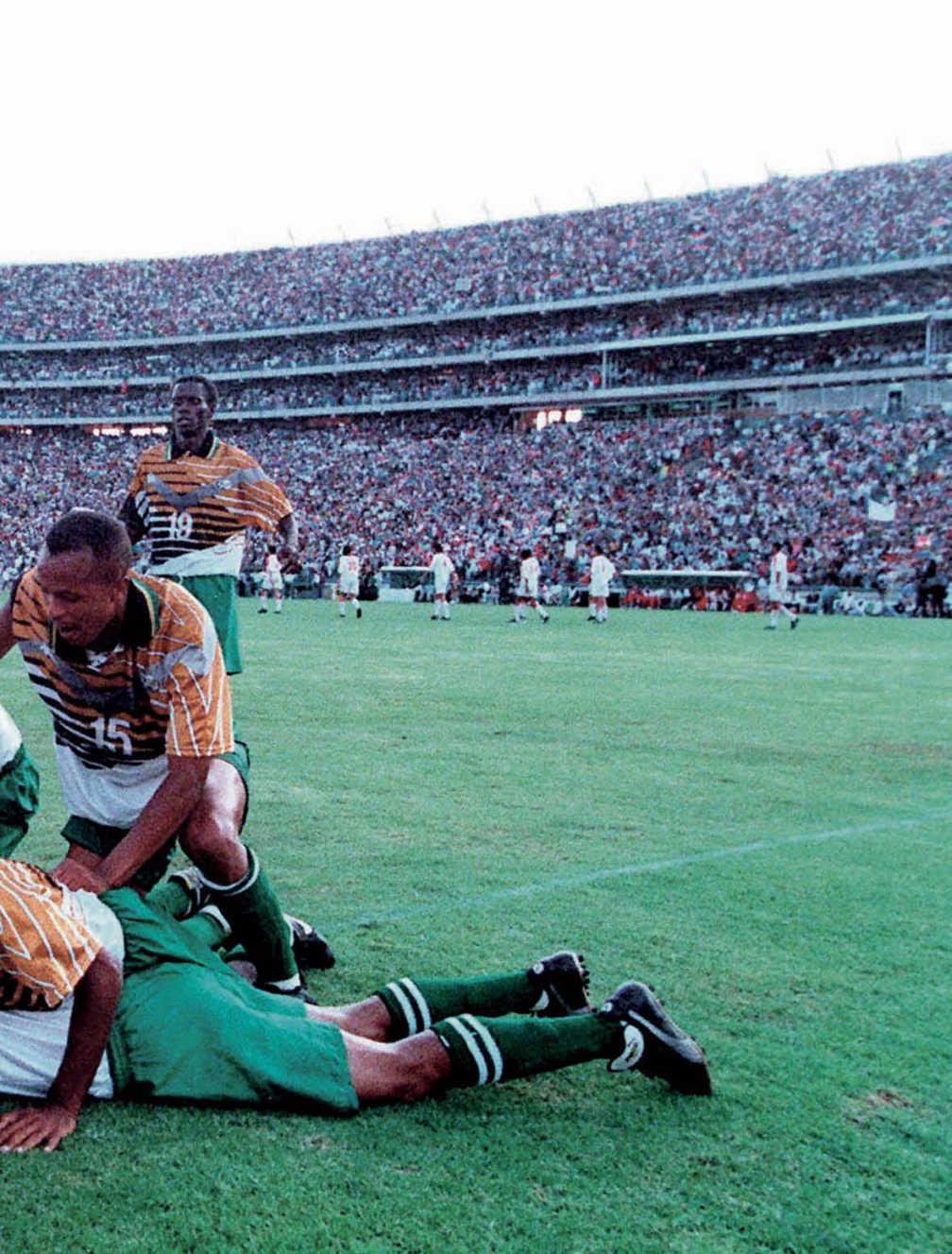 20 YEARS ON RIDING THE WAVE South Africa made it back-to-back wins with a 1-0 success over a determined Angola in wet conditions.