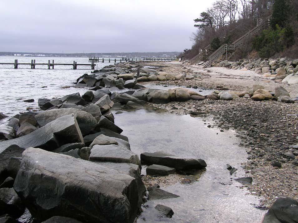 Figure 6-4. Example of a perched beach in Martha s Vineyard, MA. The perched beach has eroded behind the sill and is in need of replenishment.