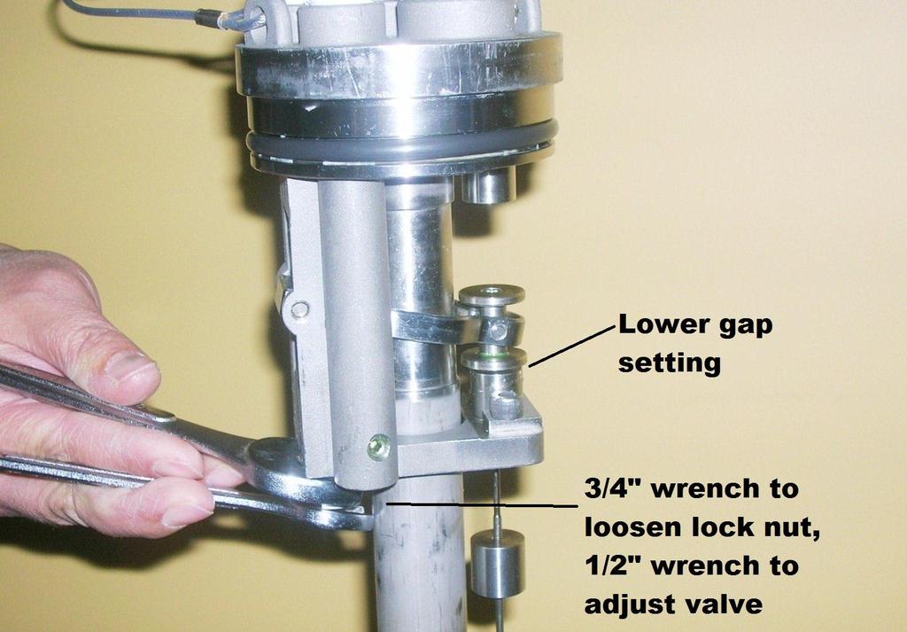 Verify and Adjust the Lower Gap Setting If an adjustment to the lower valve is needed, loosen the lock nut to the lower valve using a ¾ and ½ wrenches (Figure 4-10).