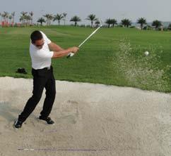 Grip down on the club as much as you sink your feet into the sand. 3. The backswing size will be determined by the length of the shot.