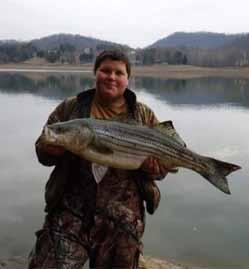 Kevin Griggs with a Cherokee Lake striper. Photo courtesy K. Griggs. ( Turkey Quota Hunts... con t from p. 13) (CST) on Jan. 16.
