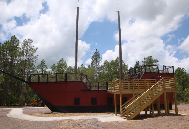 The rear of the Pirate Ship includes an external stairway and access.