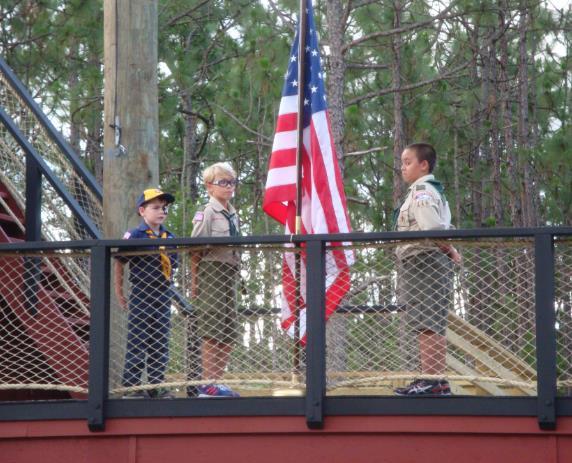 Proudly serving as Color Guard for the opening Flag Ceremony and Pledge of Allegiance were (left to right) Pack 446 Wolf Scout Trevor O