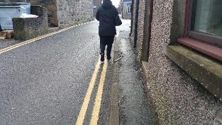These cars further narrow the road and can make it difficult for pedestrians to access the footway. Many pedestrians will choose to walk down the carriageway rather than keep crossing sides.