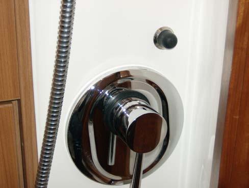 14. Showers Your yacht has a hot & cold, fresh-water shower in each head and on the transom. If the engine has been running, the hot water can be very hot be cautious!