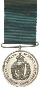 Very fine and rare. $3,250 3930* Ulster Special Constabulary Long Service Medal, (EIIR) with three Long Service bars, Queen's Commendation for Brave Conduct. Sgt. Instr. Joseph J.McGaughey.