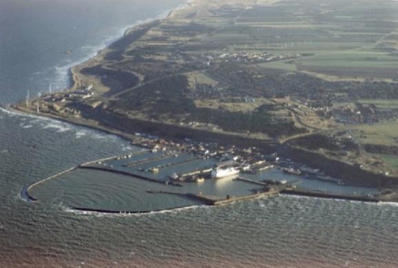 maintain an equilibrium depth in front of the harbour, Figure 1: Left: Location map of bypass harbours. Middle: Aerial photos.