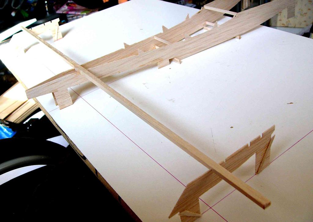 (Photo 2) Glue in the step and another strip that will hold the fuselage the right distance apart at the step.