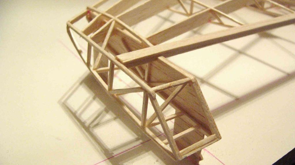 (Photo 17) Tip floats. Truss ribs look really nice, and not too hard to make. Start by framing the float part of TF1 with 1.5mm square balsa. Add a couple of cross grain parts for strength.