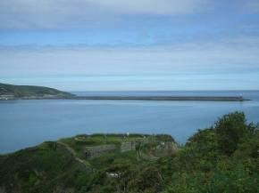 The only other development is at Penrhyn Ychen, where there is a small caravan park on the headland, and at Pwllgwaelod, where there is local road and a few properties at the western end of the