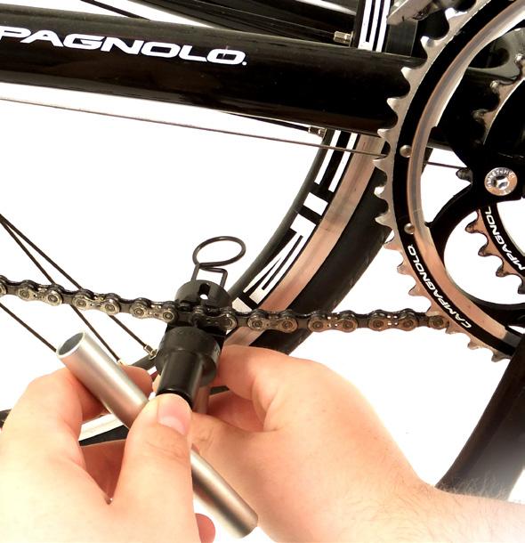 Move the chain on to the larger chainring (keeping it on the smallest sprocket), then