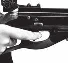 When shooting with open sights, the bullseye is placed directly on top of the front post sight which is centered in and level with the top of the rear notch sight.