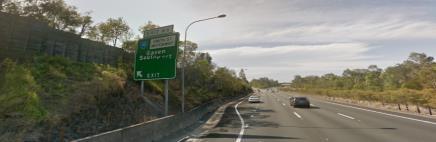 Continue, follow signs to Brisbane Merge left onto