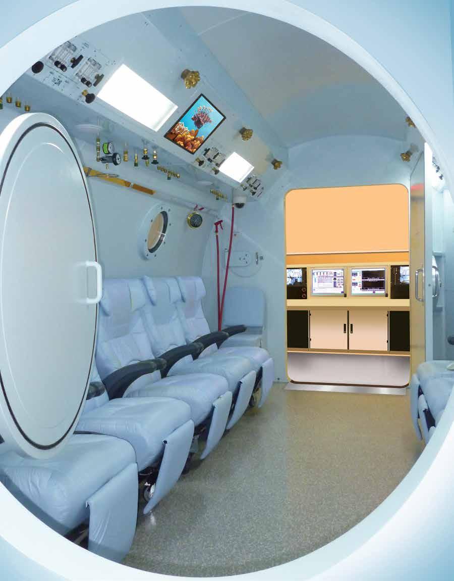 WE HEAL WITH OXYGEN OxyHeal OxyHeal 4000 Omega Series Ω Semi-Cylindrical Hyperbaric System Safe Efficient Design Optimizes Patient-Physician Care Spacious Interior Provides Patient-Comfort & Is Easy