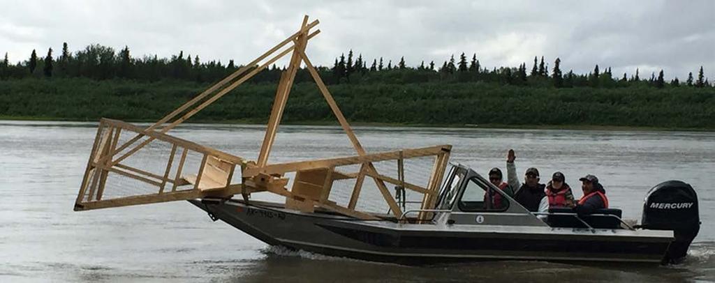 Transporting a fish wheel basket assembly