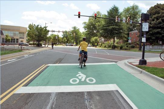 Signs should offer cyclists information about alternative routes and accessible destinations from their current location, and not simply designate the street as a bike route.