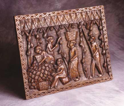 NIGERIA Carved market scene depicting the people of Nigeria.