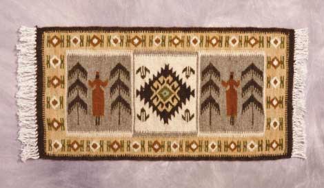 ROMANIA Woven, fringed mat (two figures, beiges and greys). Given in recognition of what Jack Dreyfus has brought to the health and lives of the Romanian people.