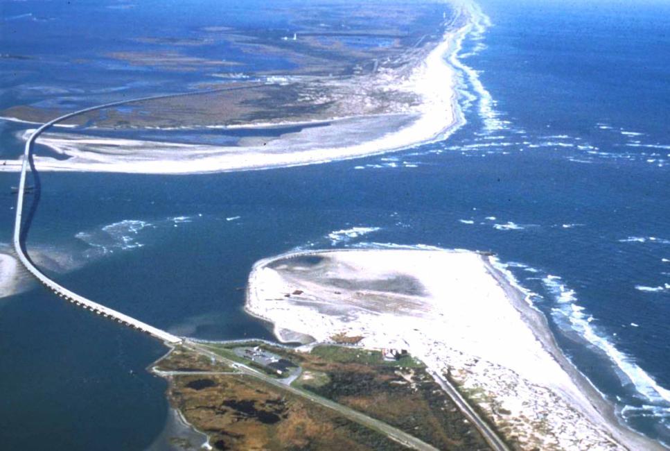 A comparison of the 1991 post-construction shoreline with an August 2006 vertical aerial photograph (Figure II-7) reveals that between these two surveys Bodie Island prograded approximately 0.