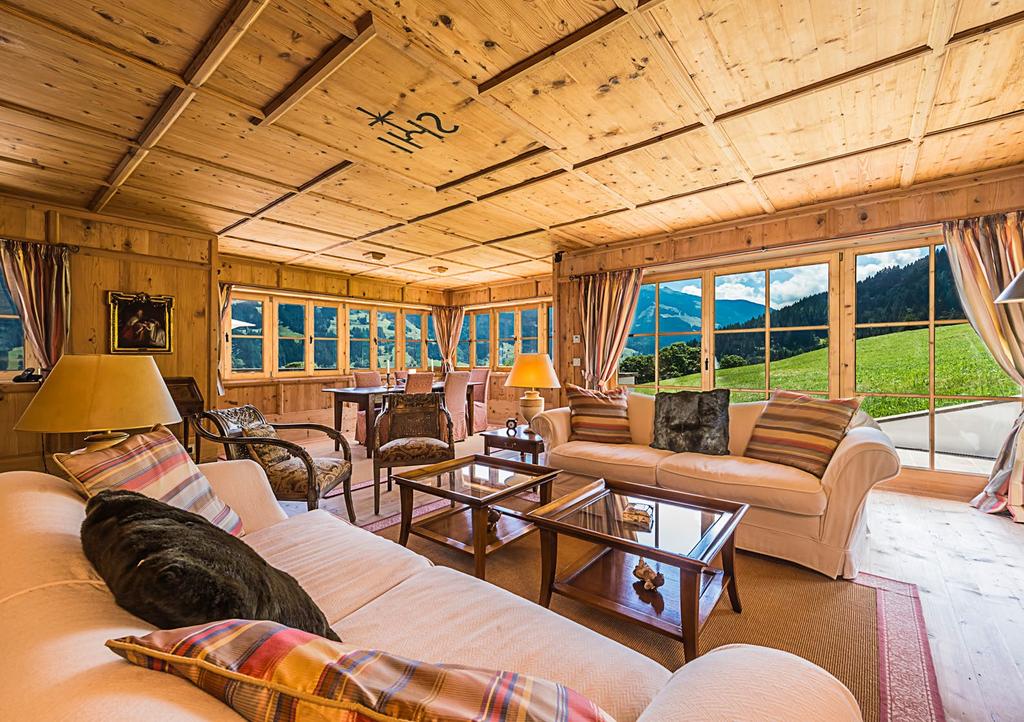 Property Information This exclusive Chalet is nestled into the hillside in a peaceful, sunny plot.