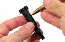 (Figure 25) FIGURE 24 FIGURE 25 BULLET STUCK IN THE BORE WARNING: IF AN AUDIBLE POP OR REDUCED RECOIL IS EXPERIENCED