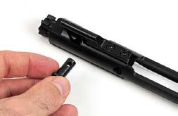A Bullet tip can help push it out of the Bolt Carrier.