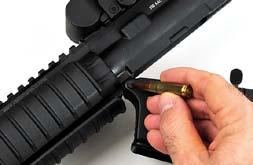 IF A BULLET IS STUCK IN THE BARREL OF THE WEAPON, DO NOT TRY TO REMOVE IT. TAKE THE RIFLE TO A QUALIFIED GUNSMITH. 9.