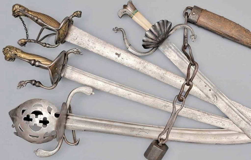 Flail weapon, German, around 1600. Chain and striking head, attached to a wooden handle. Hunting sabre, German, around 1550. Quillons with a shell guard forged on.