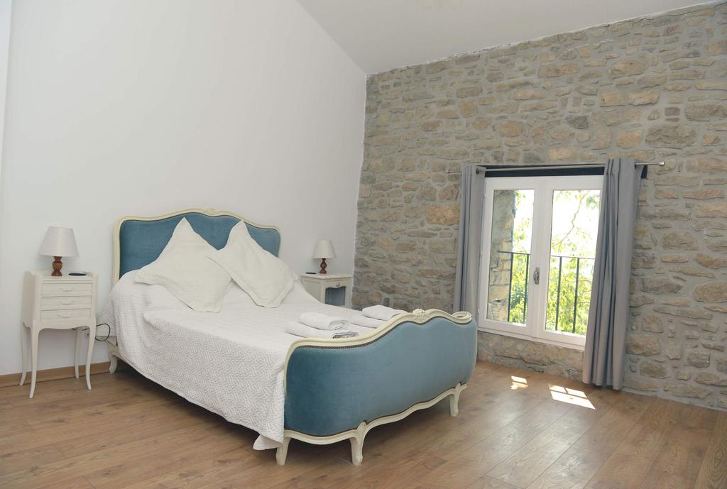 Aude A light and airy bedroom with garden and mountain views. One double bed and one single bed. Can sleep up to three people.