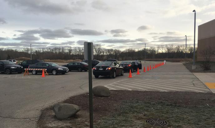 Twenty-eight buses operated in three areas around the campus with the main drop-off location at the front of the school. Students remained on buses until they were released at 8:25 a.m. Parents dropped off students using a drop-off zone at the front of the school delineated with cones.