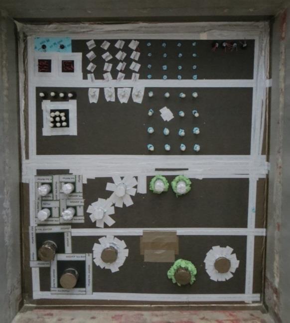Figure 2: Wood-frame wall with different air sealing solutions in steel test rig B. Small-scale test setup A small test box measuring 300 x 300 x 300 mm was built using plywood with an epoxy coating.
