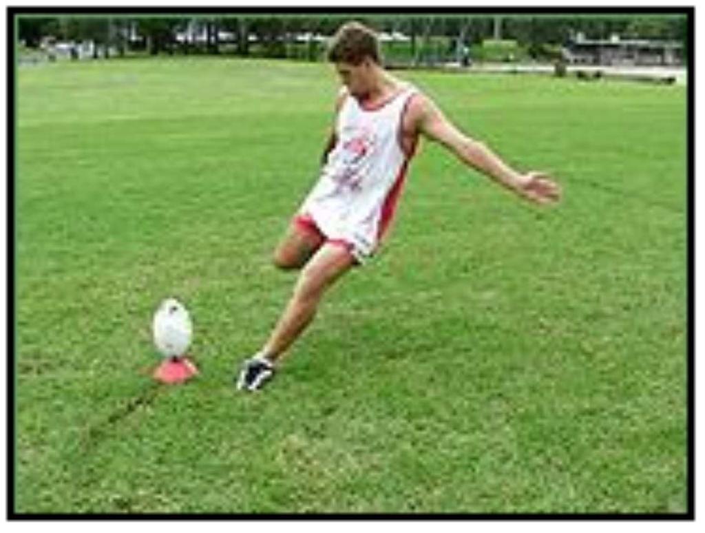 - The non-kicking foot is placed alongside the ball, about 20cm away, point in the