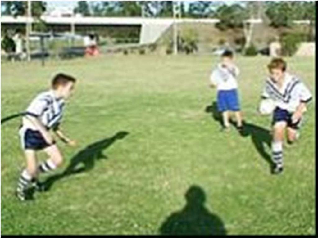 SKLLS TEACHING POINTS: TACKLE FROM SIDE - On approach to the tackle, try