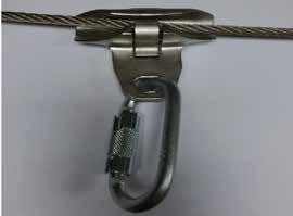 Slide the latch back to the closed position and the cable clamp will trap the stainless steel cable onto the