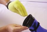 If the WristDam is properly trimmed, the glove will vent the excess air when the hand is closed into a fist and the wrist is flexed.