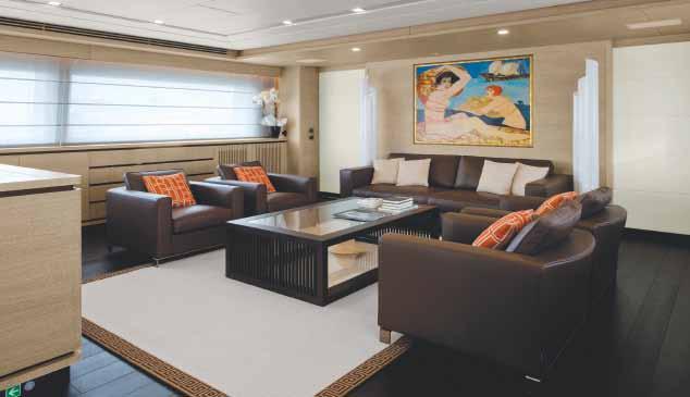 The owner s suite, on the main deck, is a particularly welcoming environment thanks to its full-beam dimensions with a central bed, a vanity area to port and a relaxing area with an armchair with