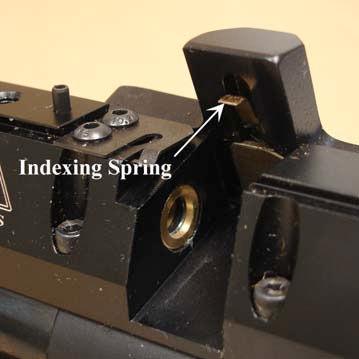 MOUNTING/DEMOUNTING THE MAGAZINE & PELLETS DEMOUNTING Fully cock the rifle, grip the magazine as shown below and slide out
