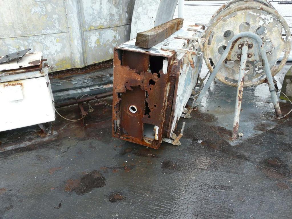 The cause of running rust. All over the various decks are deck storage boxes, line reels, pipe fittings, sound powered phone boxes, and so on made out of steel.