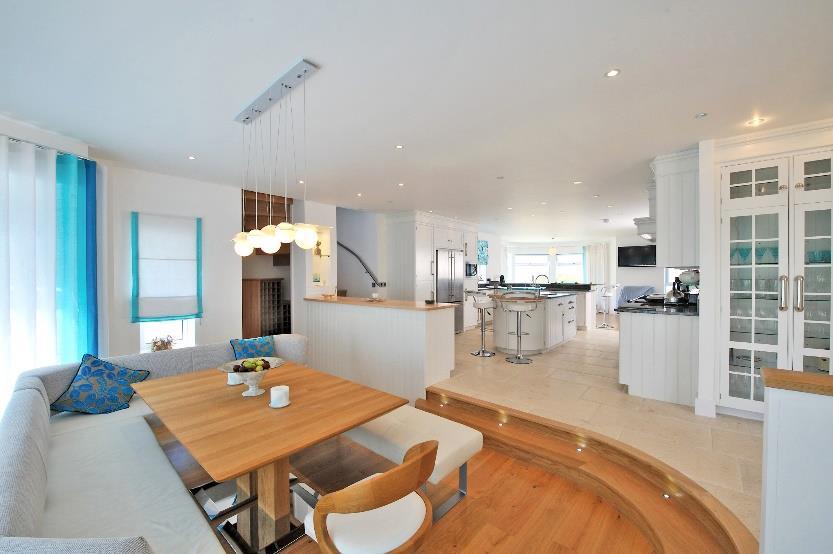 An exceptional, contemporary coastal residence with nearly