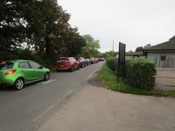changes to car parking arrangements for Pembroke College and measures to protect the sports grounds and activities, such as fencing or hedge