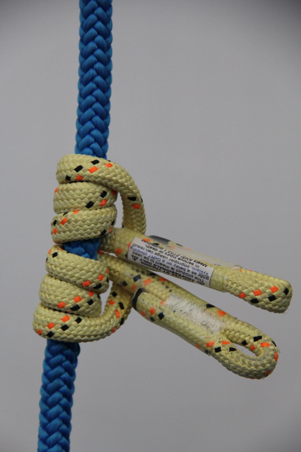 3-wrap English Prusik: this is a friction hitch used in both climbing and rigging applications. It is bidirectional in some applications.