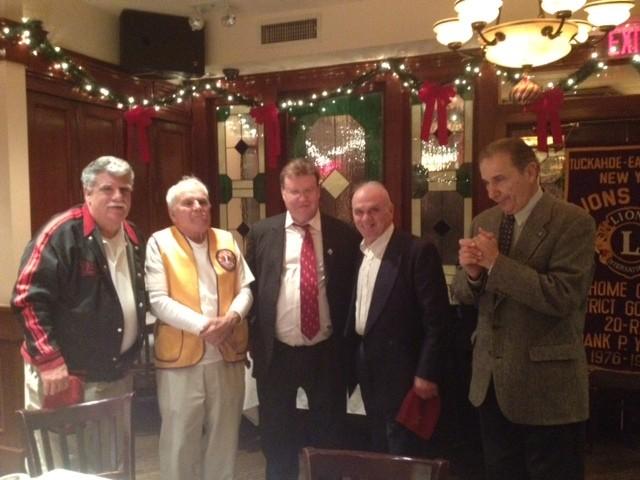 Past District Governor of District 20R-2 (Above) Lion Frank Cuomo, (far right) welcomed two new lions into our