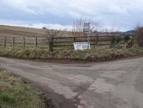 The road bends right and then dips, ignore a footpath sign to the left. Turn right when you reach a T-junction heading towards Bransby.