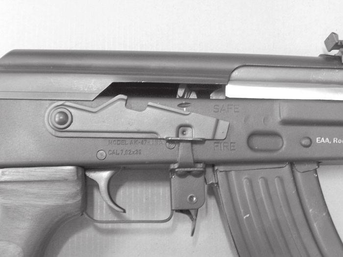 You must also check the bore for any fired shot or wad jammed inside the barrel. External Control Parts: Bolt Block Safety: Located on receiver above trigger, pivot slide style.