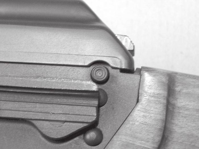 the magazine well. With the lugs engaged you should be able to swing the magazine up into the locked position.